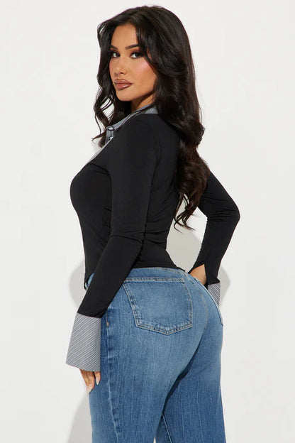 SOUTHWEST UNLIMITED The Executive Flair, a sleek black leather briefcase with polished metal accents and a spacious interior.