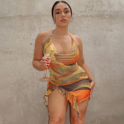 SOUTHWEST UNLIMITED Tropical Heat Dress featuring a vibrant tropical print and a flowing silhouette.