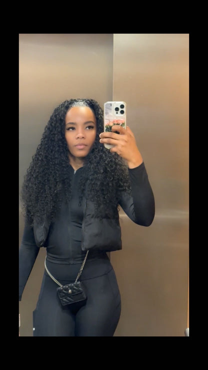 SOUTHWEST UNLIMITED Pixie Curly hairstyle featuring tight curls and a stylish cut in a vibrant color.