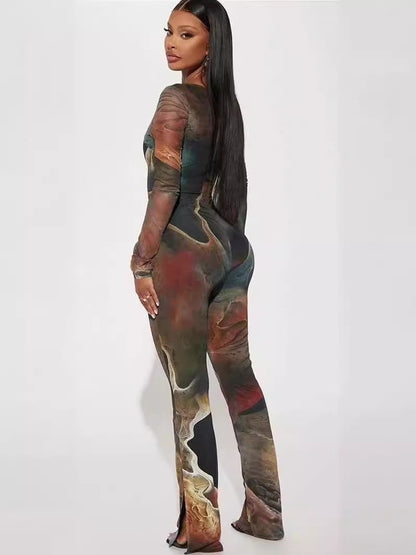 Midnight Muse jumpsuit by SOUTHWEST UNLIMITED, featuring a sleek design and elegant silhouette in a dark, rich color.