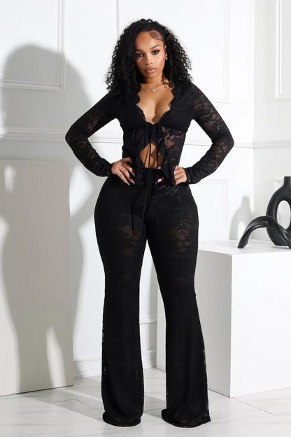 Sultry Net Two-Piece by SOUTHWEST UNLIMITED featuring a sleek design and intricate net detailing for a stylish look.