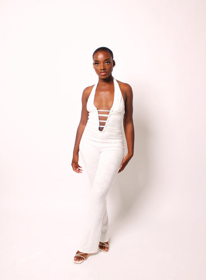 Lena lace jumpsuit by SOUTHWEST UNLIMITED featuring intricate lace detailing and a stylish silhouette.