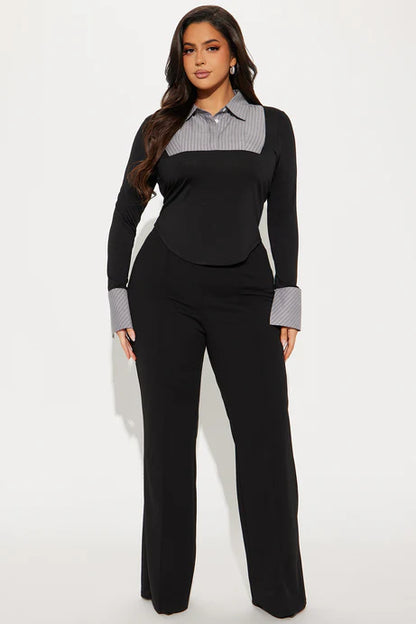 SOUTHWEST UNLIMITED The Executive Flair, a stylish black leather briefcase with sleek design and multiple compartments.