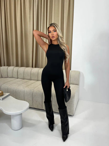 SOUTHWEST UNLIMITED Second Skin jumpsuit in a sleek black design, featuring a fitted silhouette and long sleeves.