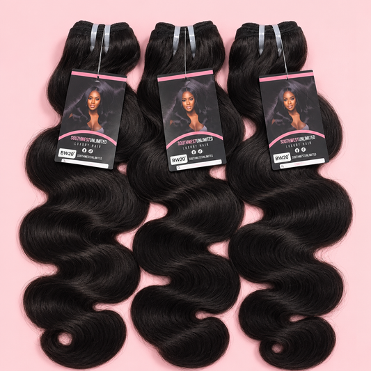 Three black body wave hair bundles with pink and black labels on a pink background