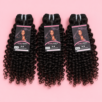 Three bundles of black kinky curly hair extensions with product tags, shown on a pink background